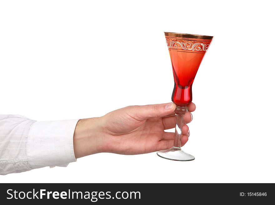 The man's hand holds a glass for wine is isolated on white a background