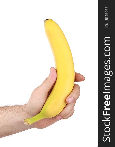 The man's hand holds a banana, is isolated on a white background