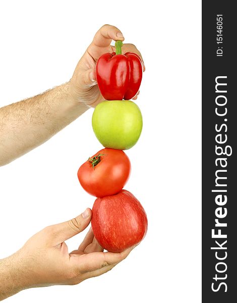 The man's hand holds fruit, is isolated on a white background