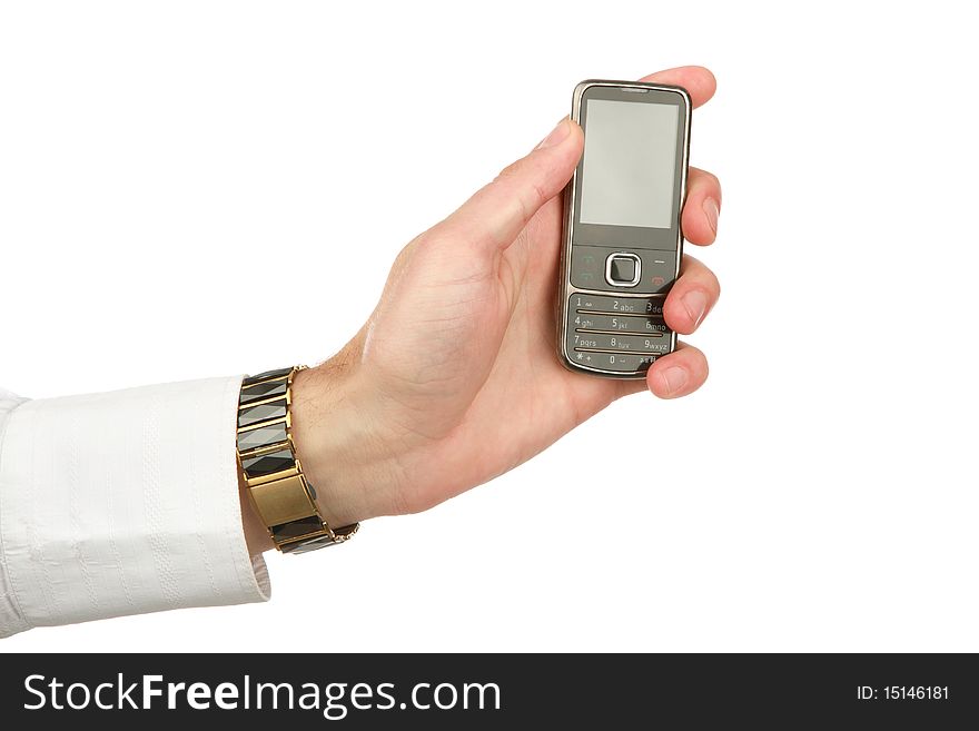 The man's hand holds rmobilephone is isolated on white a background. The man's hand holds rmobilephone is isolated on white a background