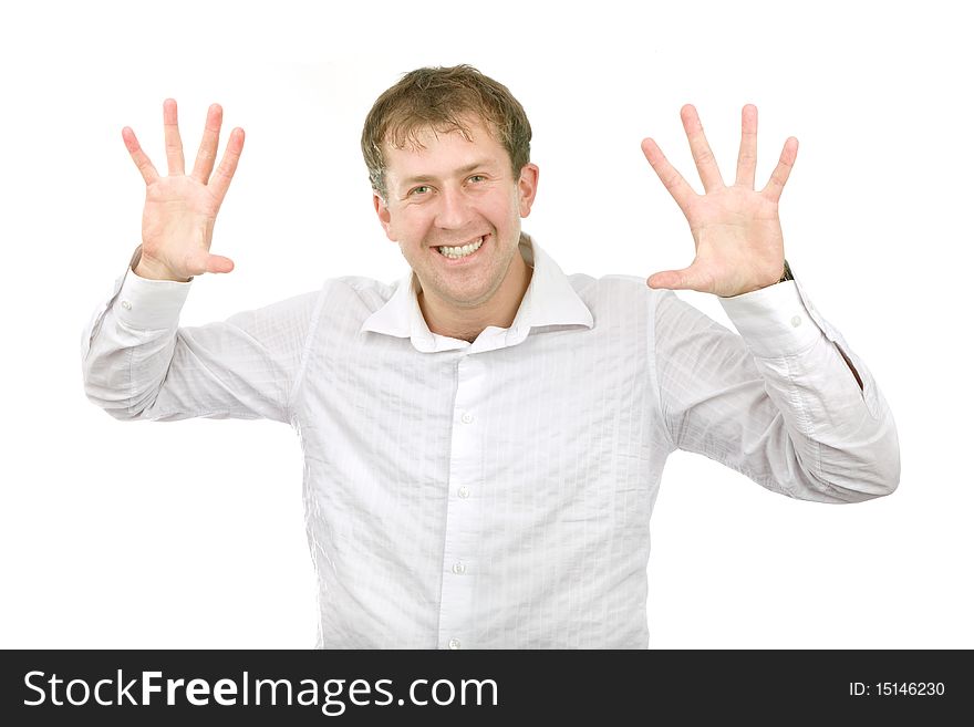 The young man smiles on a white background