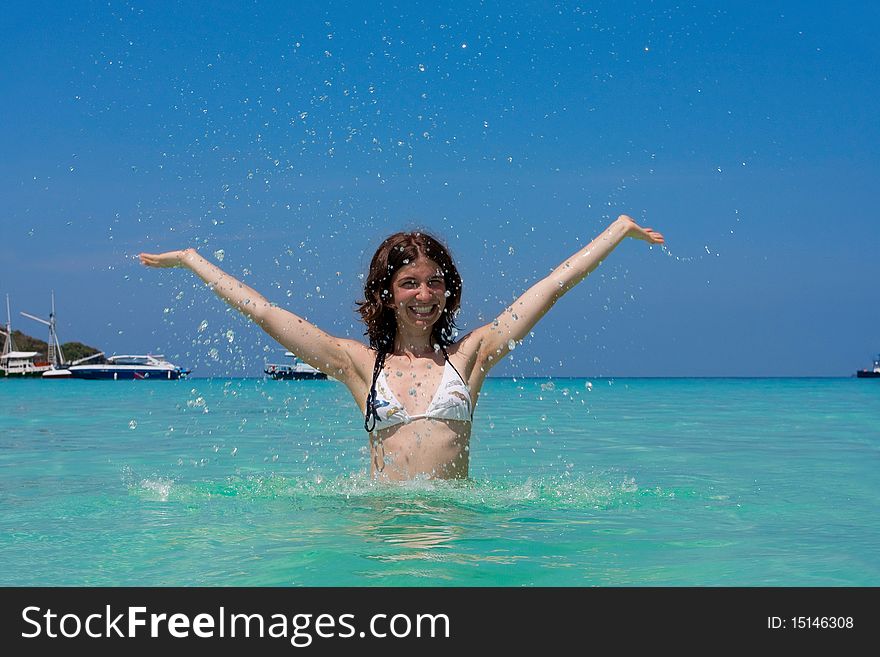 Girl with long hair playing in the sea. Girl with long hair playing in the sea