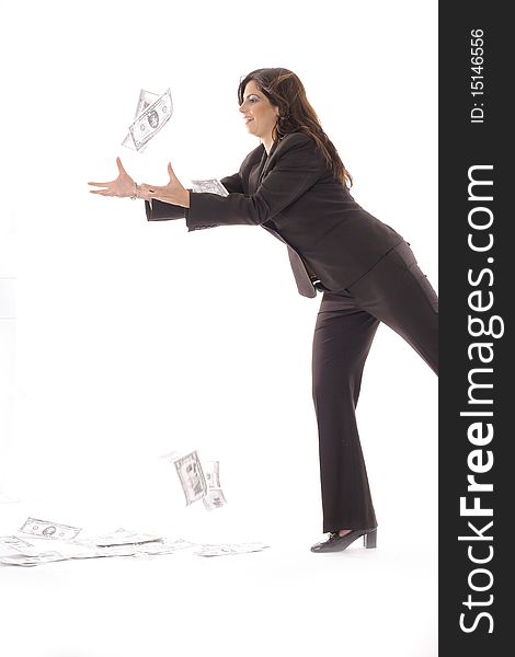 Shot of a woman in business suit catching money vertical