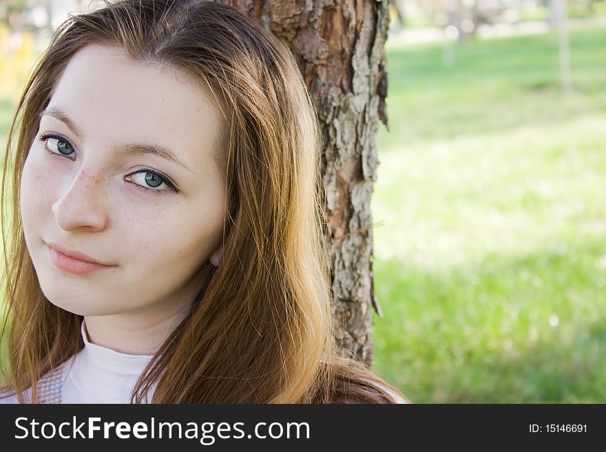 Outdoor portrait of young beautiful girl