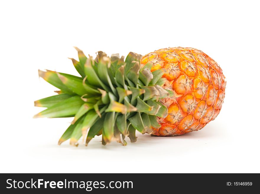 The image of ripe pineapple on a white background. The image of ripe pineapple on a white background