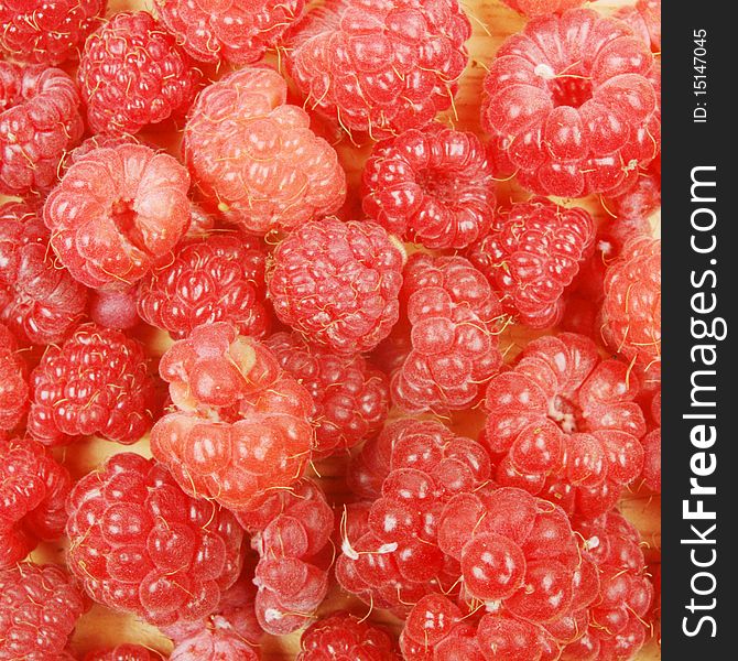 Raspberries as a background and texture