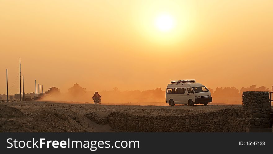 Sunset and a dusty road in Nepal. Sunset and a dusty road in Nepal