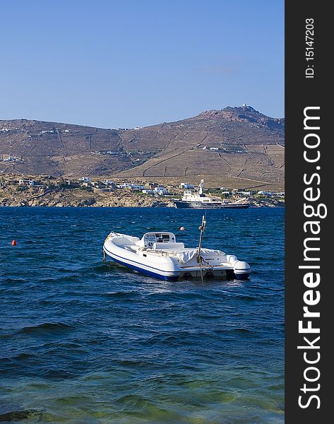 White Motor Boat In The Blue Sea