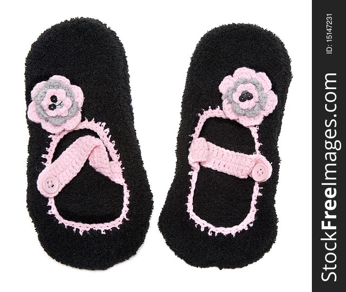 Knitted baby footwear insulated on white background