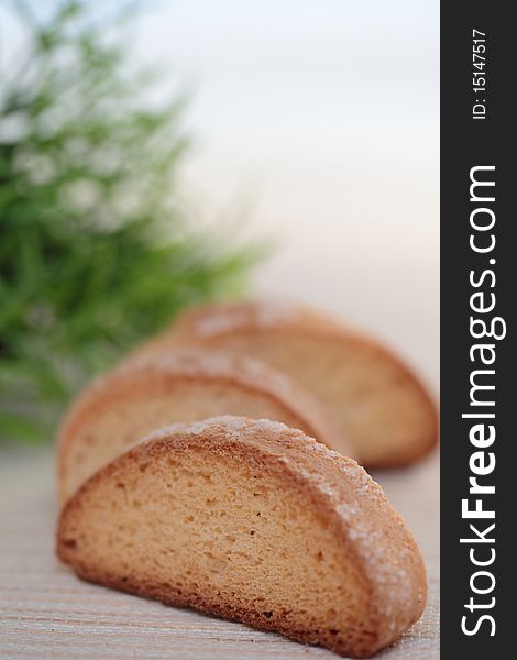 Three brown rusk on table. Three brown rusk on table