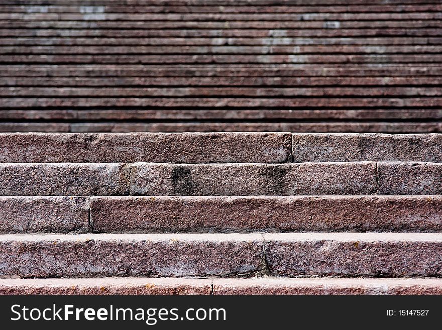 Old stone broken staircase under the Sun