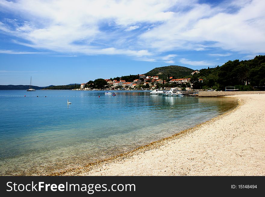 This photo was taken from the beach Hotel Imperial in a small town in Croatia .. in the background mountain range, and small houses on the front of this town . This photo was taken from the beach Hotel Imperial in a small town in Croatia .. in the background mountain range, and small houses on the front of this town ..