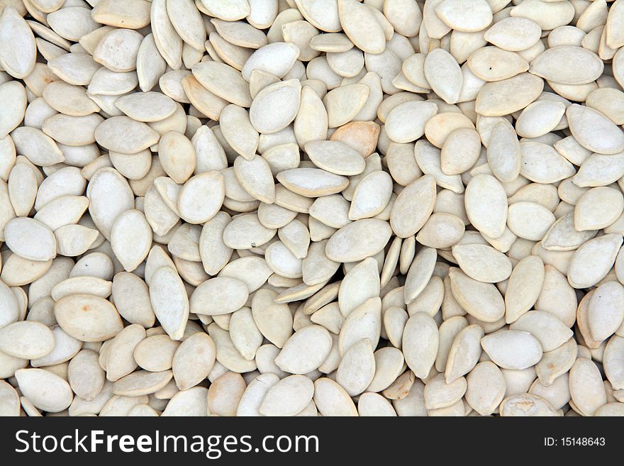 Background of white pumpkin seeds. Background of white pumpkin seeds