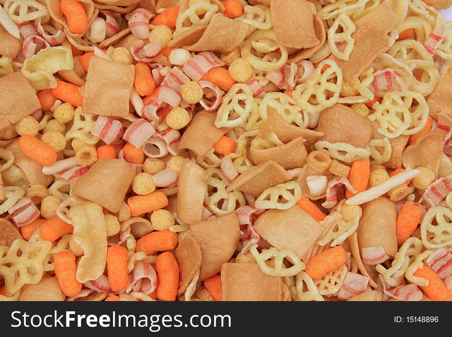 Colorful background of crisp fried snacks. Colorful background of crisp fried snacks