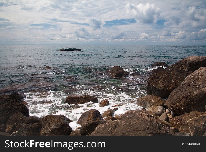 Black Sea. Sea surf. Kind of a wave crashed against the rocks.