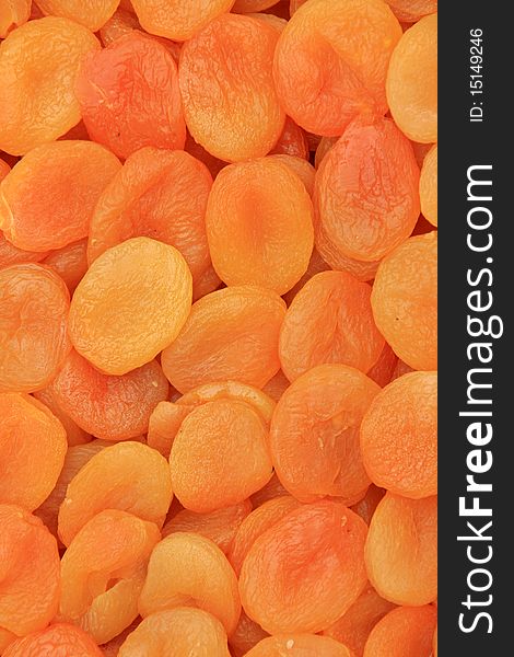 Background of orange dried peaches. Background of orange dried peaches