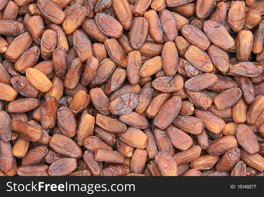 Background of brown dried dates. Background of brown dried dates