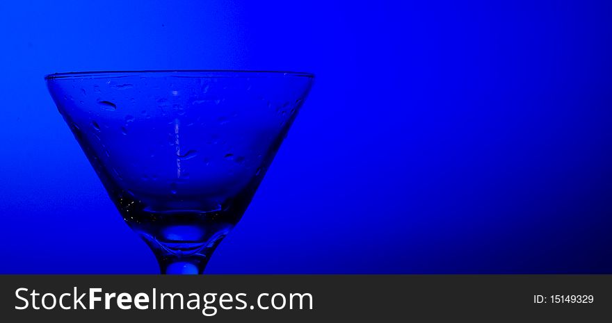 Glass cocktail on the blue background