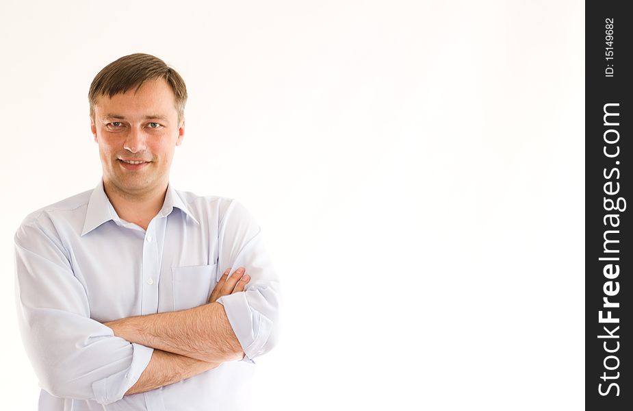 Portrait of a happy businessman on a white background