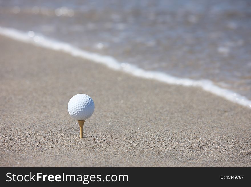 Golf ball in the beach