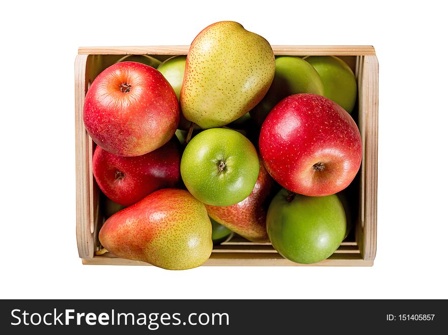 Ripe apples and pears in a wooden box isolated on white background. Autumn seasonal image with top view