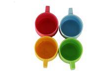 Multi-coloured Tea Cups Royalty Free Stock Images
