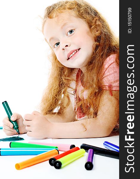 Portrait of a happy girl with felt pens. Isolated over white background. Portrait of a happy girl with felt pens. Isolated over white background.