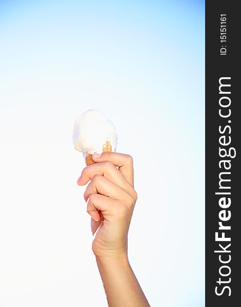 Hand holding icecream in summer