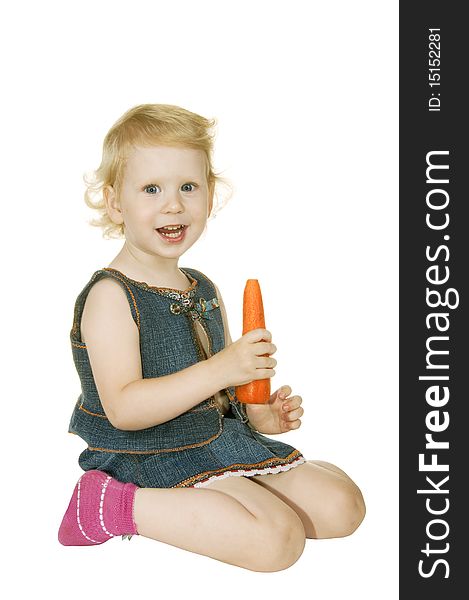 Small girl with carrot on white background