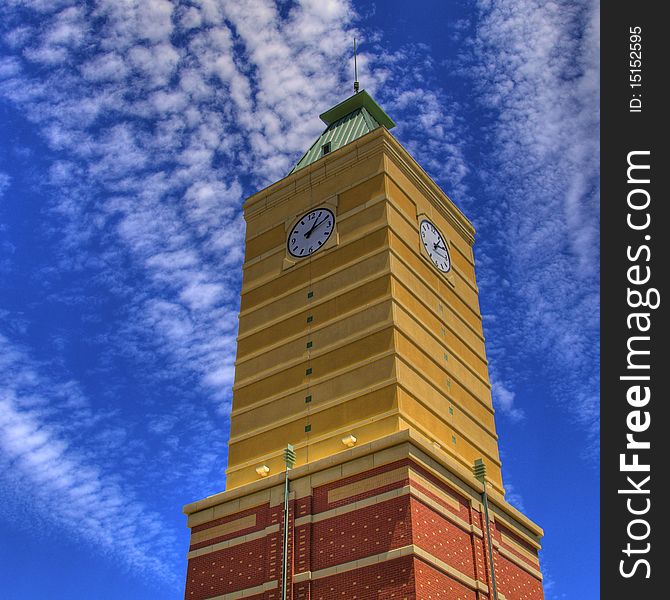 Spectacular persective of a modern clock tower with vibrant sky. Spectacular persective of a modern clock tower with vibrant sky