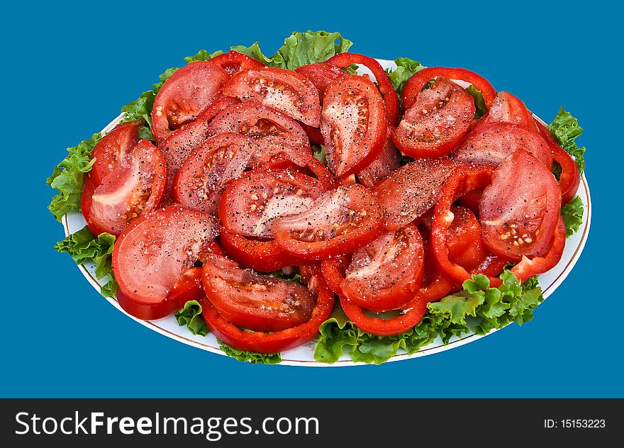 Salad from a tomato on the big plate. Salad from a tomato on the big plate