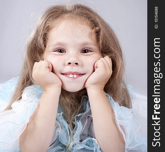 Portrait of beautiful little girl. Studio shot.