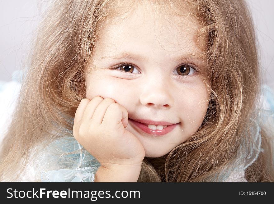 Portrait of beautiful little girl. Studio shot.