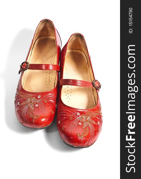 Pair of red embroided shoes