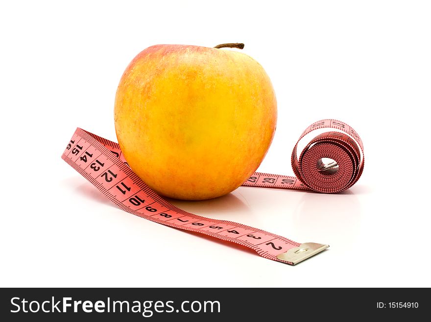 Apple and meter on a white background