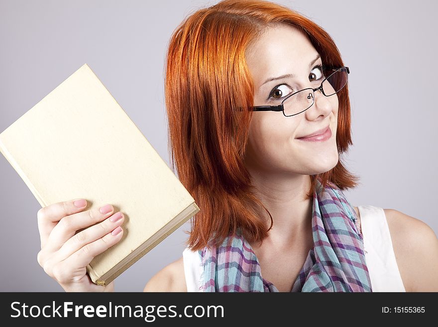 Red-haired Girl Keep Book In Hand.