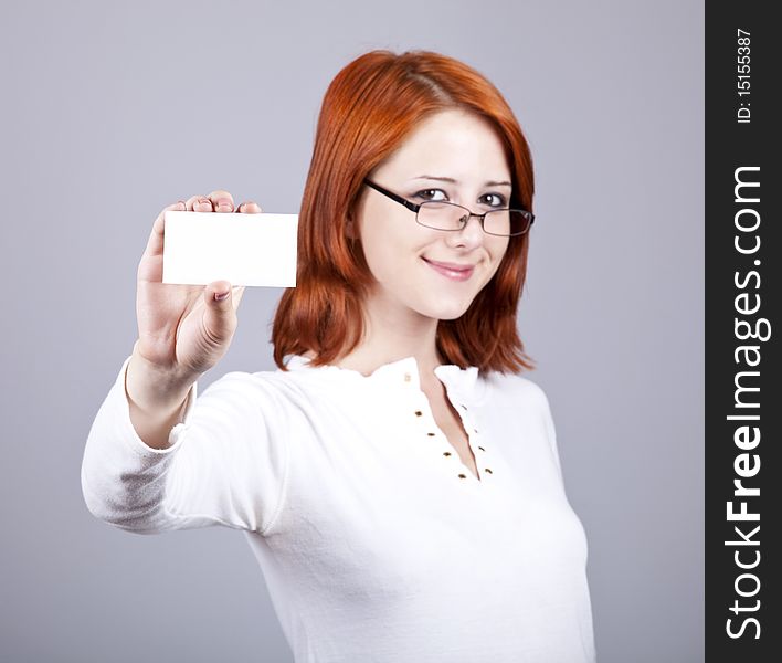 Portrait of an young beautiful happy woman with blank white card. Portrait of an young beautiful happy woman with blank white card