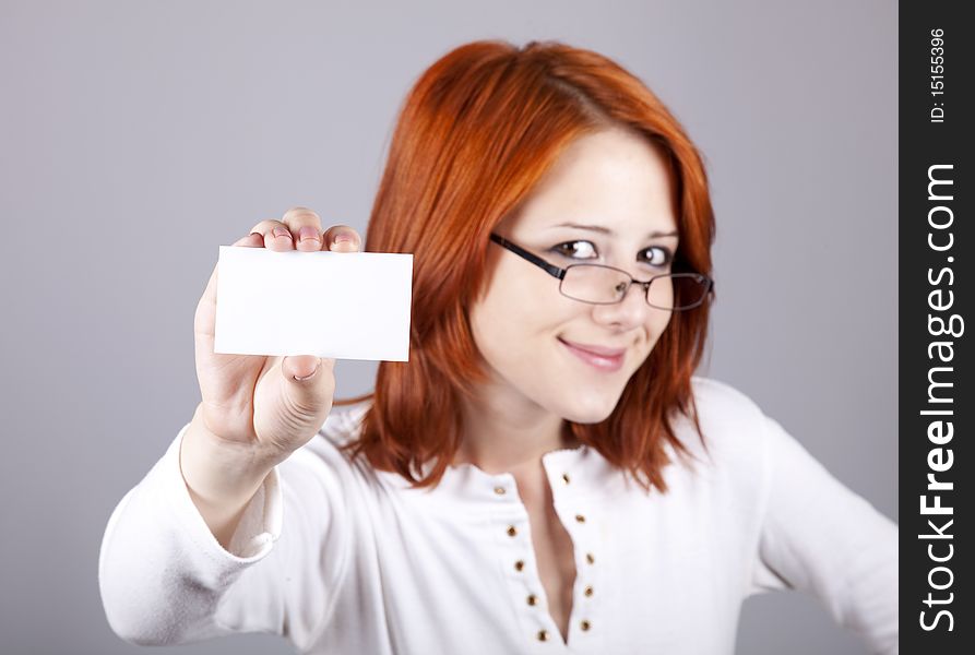 Portrait of an young beautiful happy woman with blank white card. Portrait of an young beautiful happy woman with blank white card