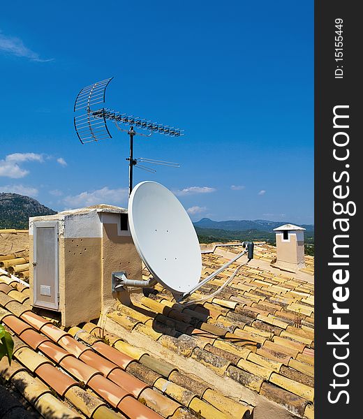 Antenna on a Tile Roof. Majorca, Spain