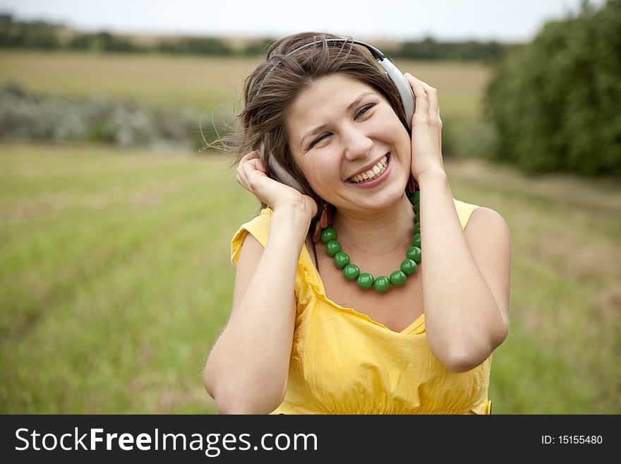 Young Smiling Fashion Girl With Headphones