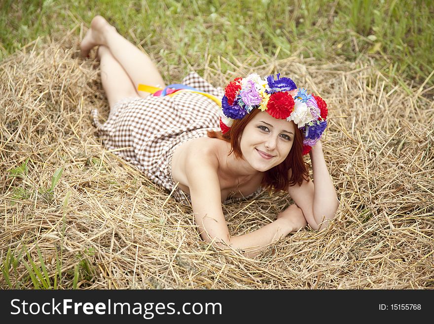 Girl In Slav National Wreath Lying At Field.