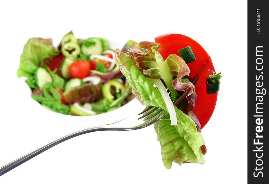 Fork with vegetable salad