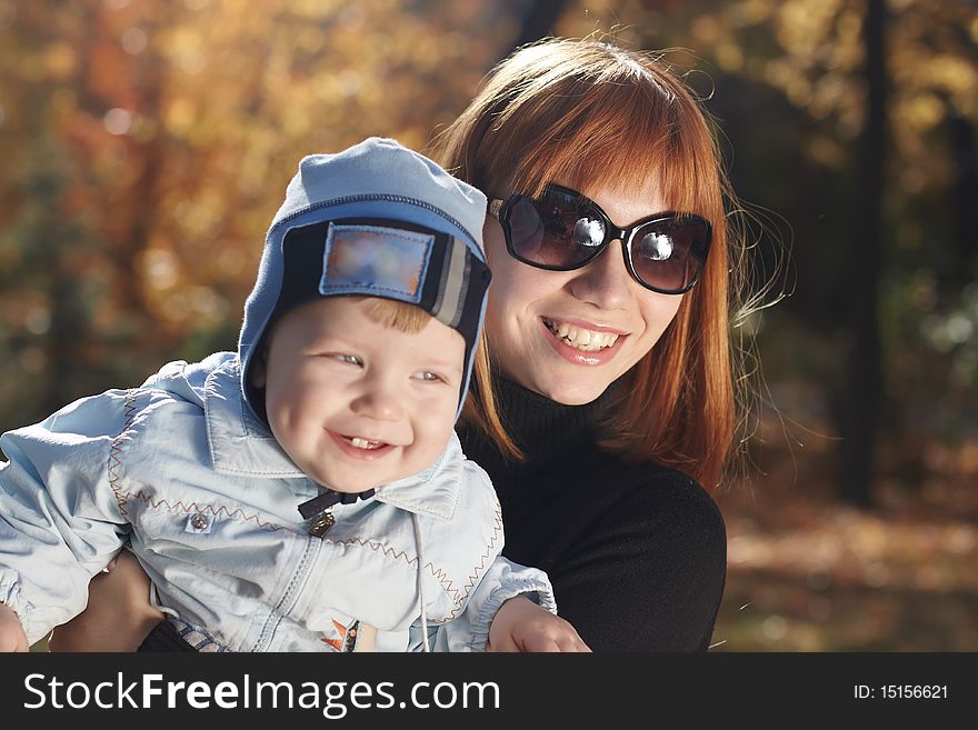 Baby boy with mother play in park. Baby boy with mother play in park