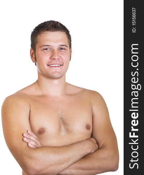 Young happy muscular man isolated on a white background. Young happy muscular man isolated on a white background