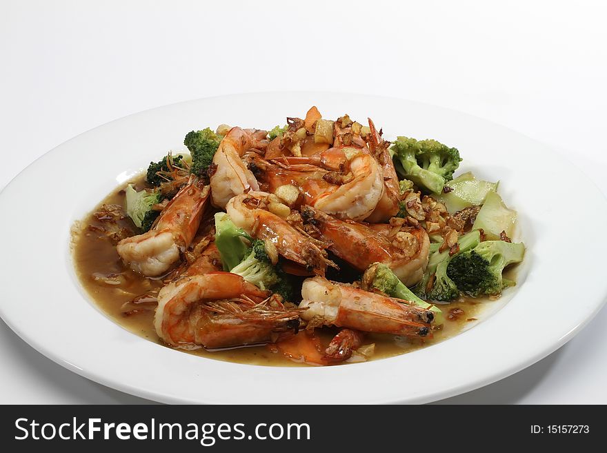 Fried shrimp placed on a white plate. Fried shrimp placed on a white plate.