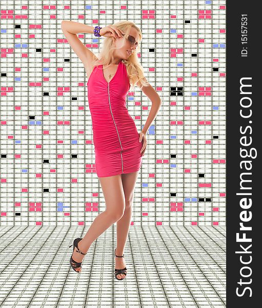 Girl in a pink dress against colour glass panels. Girl in a pink dress against colour glass panels