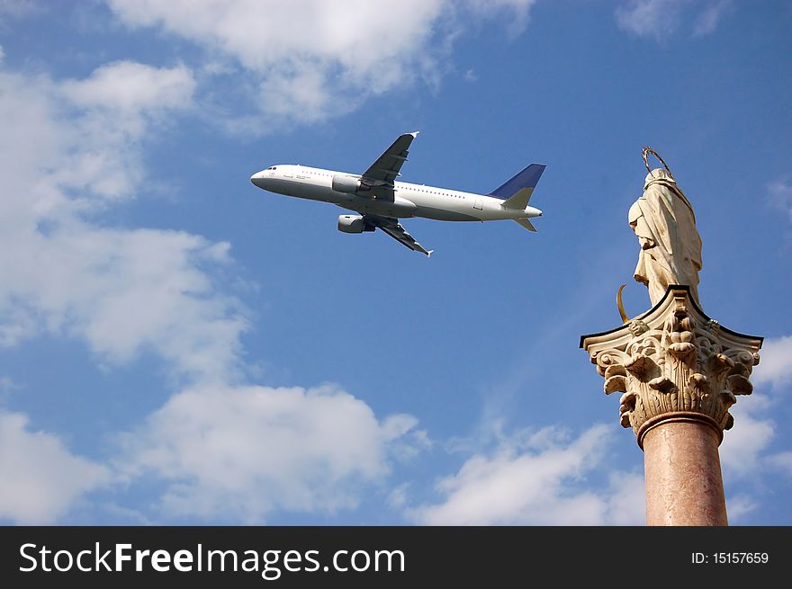 A plane in the sky  on Marienplatz of Monaco of Bavaria. A plane in the sky  on Marienplatz of Monaco of Bavaria