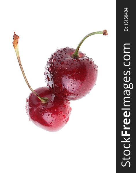 Two red cherries on a white background.