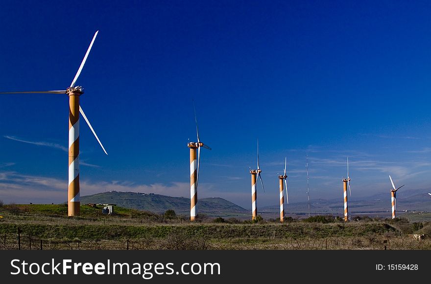 Wind turbines at work generating electricity for 2000 homes. Wind turbines at work generating electricity for 2000 homes