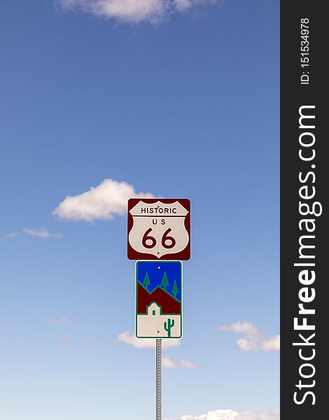 Route 66 sign under clear blue sky in Golden valley